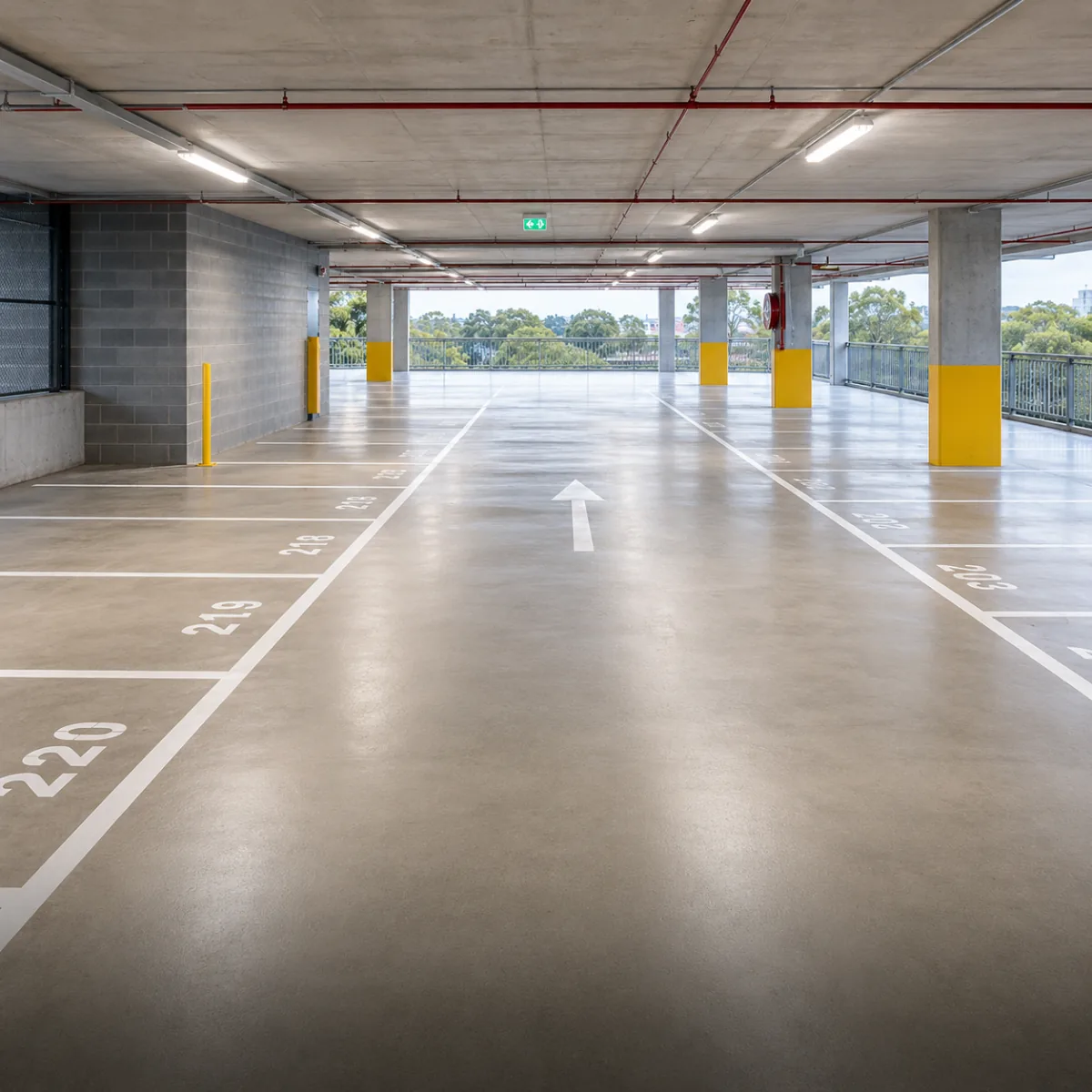 Empty multi-storey car park bay, freshly swept